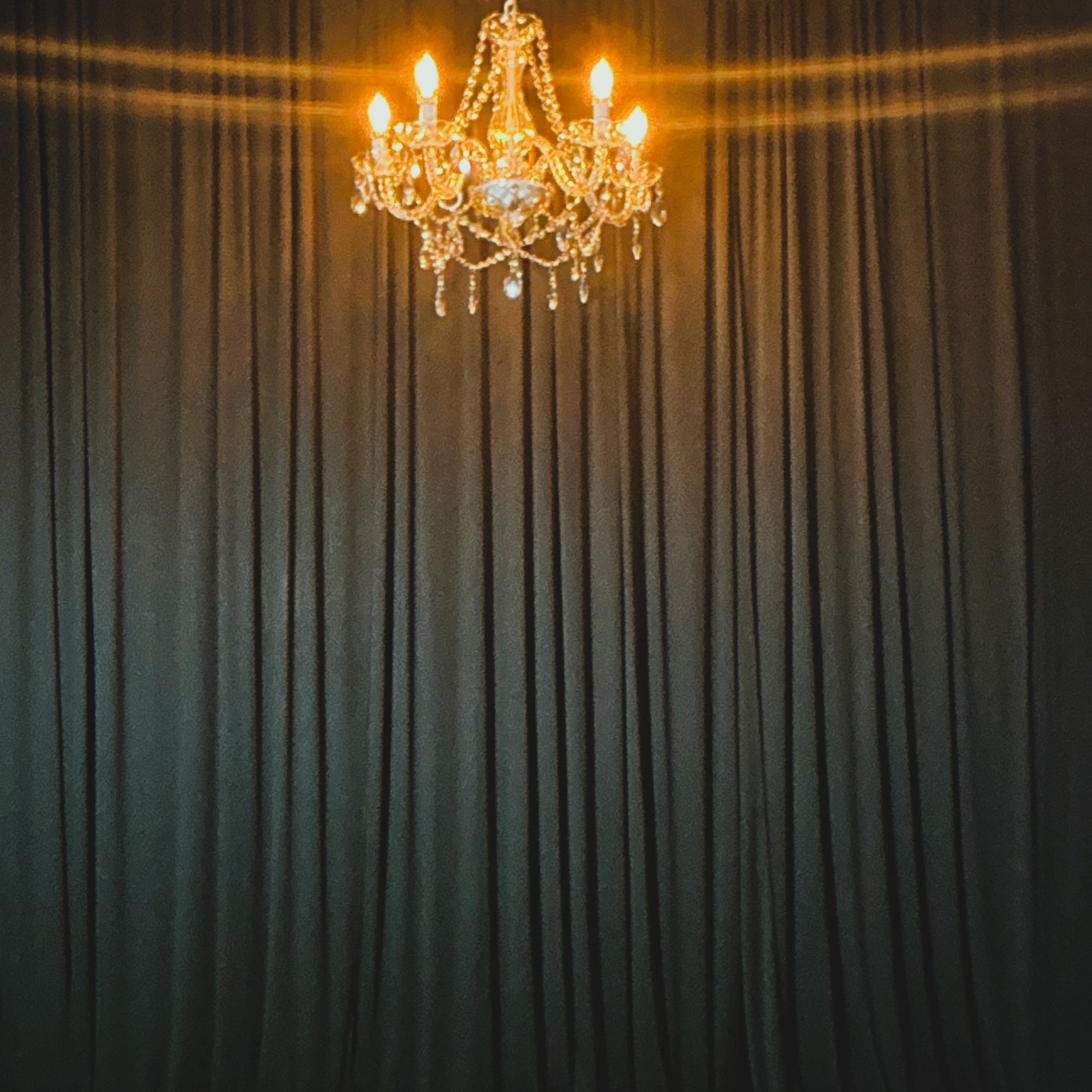 Black Curtains with Chandelier